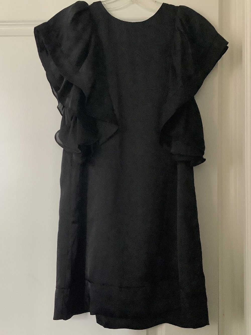 Urban Behavior mini dress with ruffle sleeves.